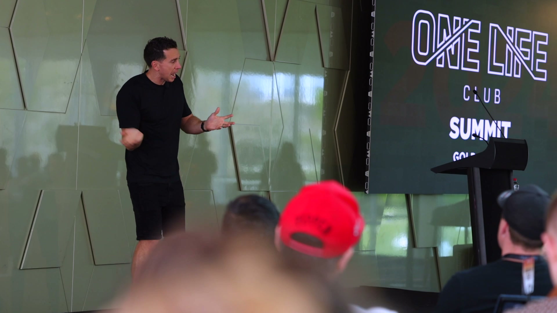 Simon Beard speaking at a One Life Club summit